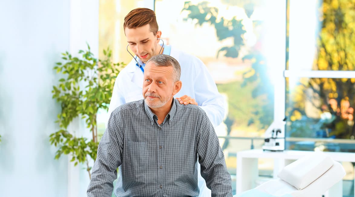 doctor checking up his patient