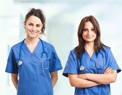 two nurses smiling